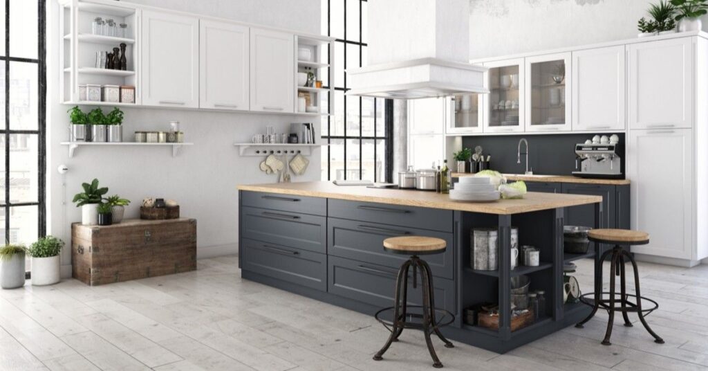Open kitchen and kitchen island with grey wood flooring