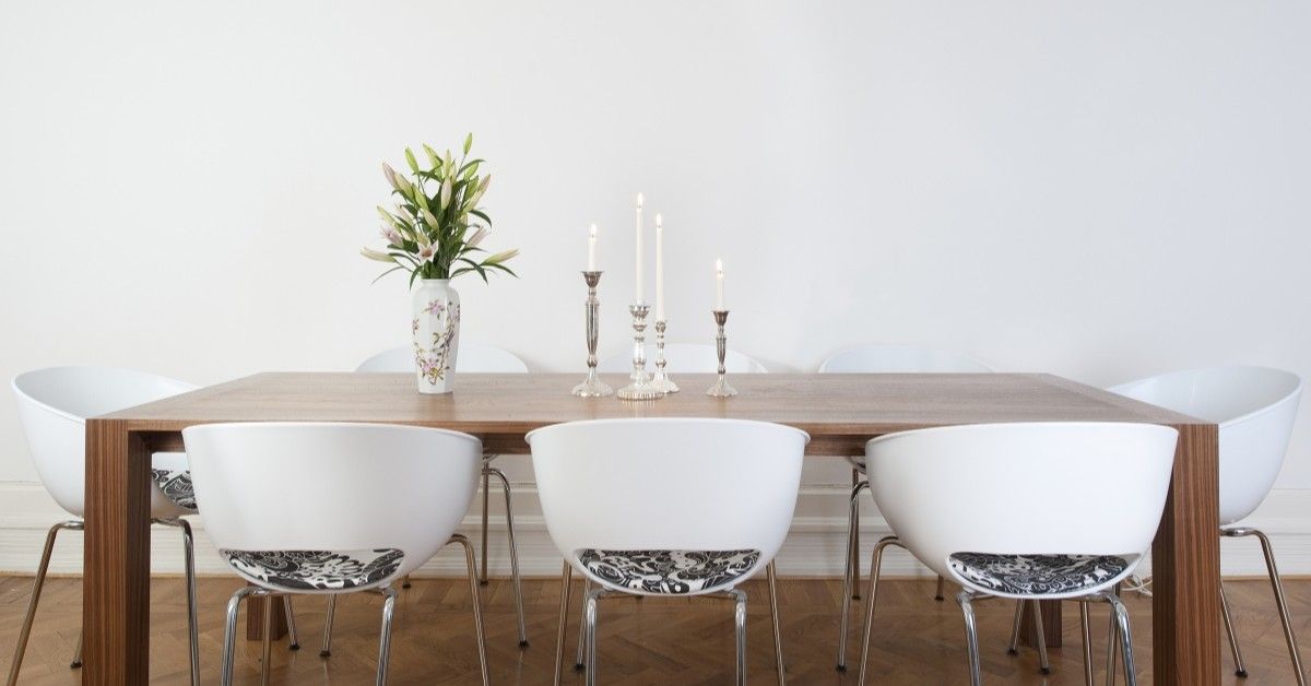 Dining room with herringbone wood floors