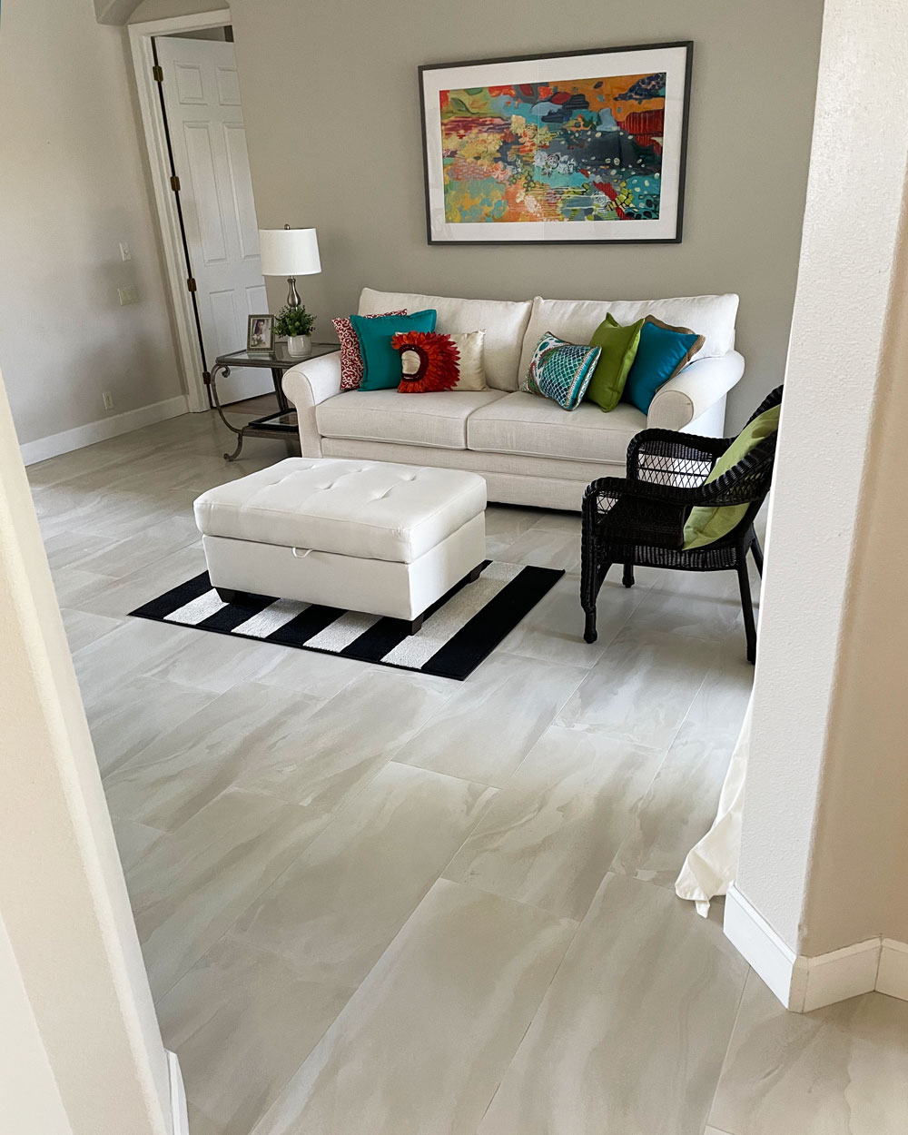 Living room with white and grey tile planks