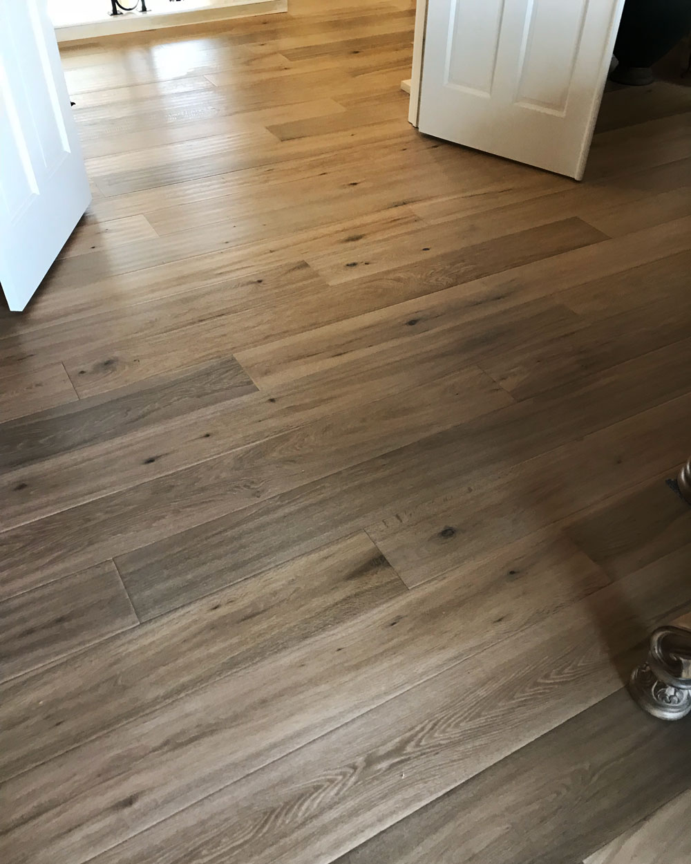 Room with brown hardwood floors