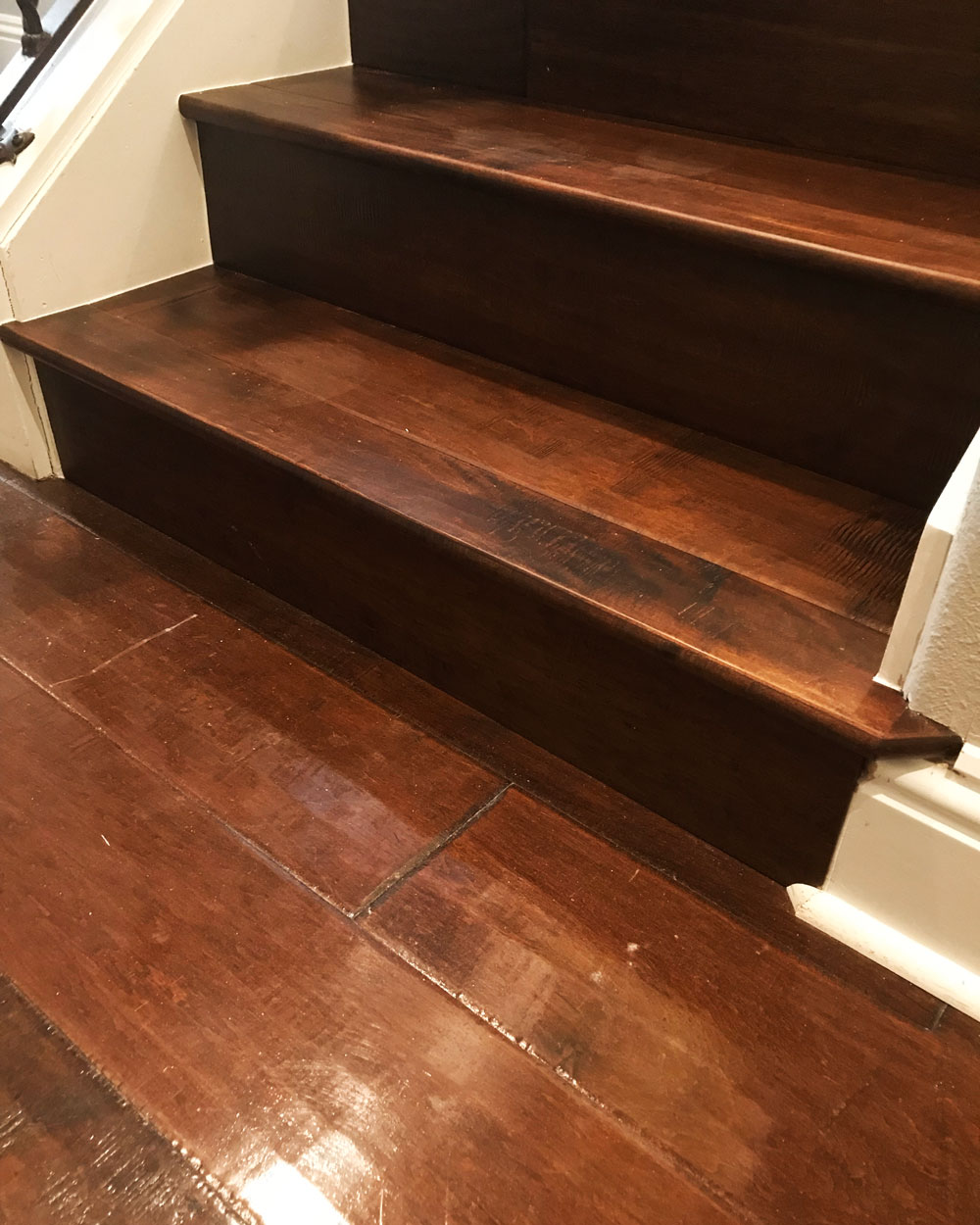 Staircase steps with mahogany hardwood floors